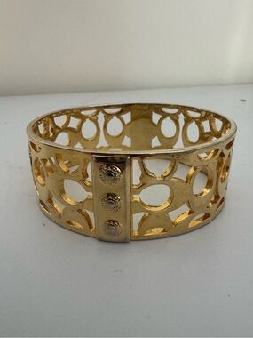 COACH Vintage Gold-Tone Signature C Cutout Openwork Bangle Bracelet